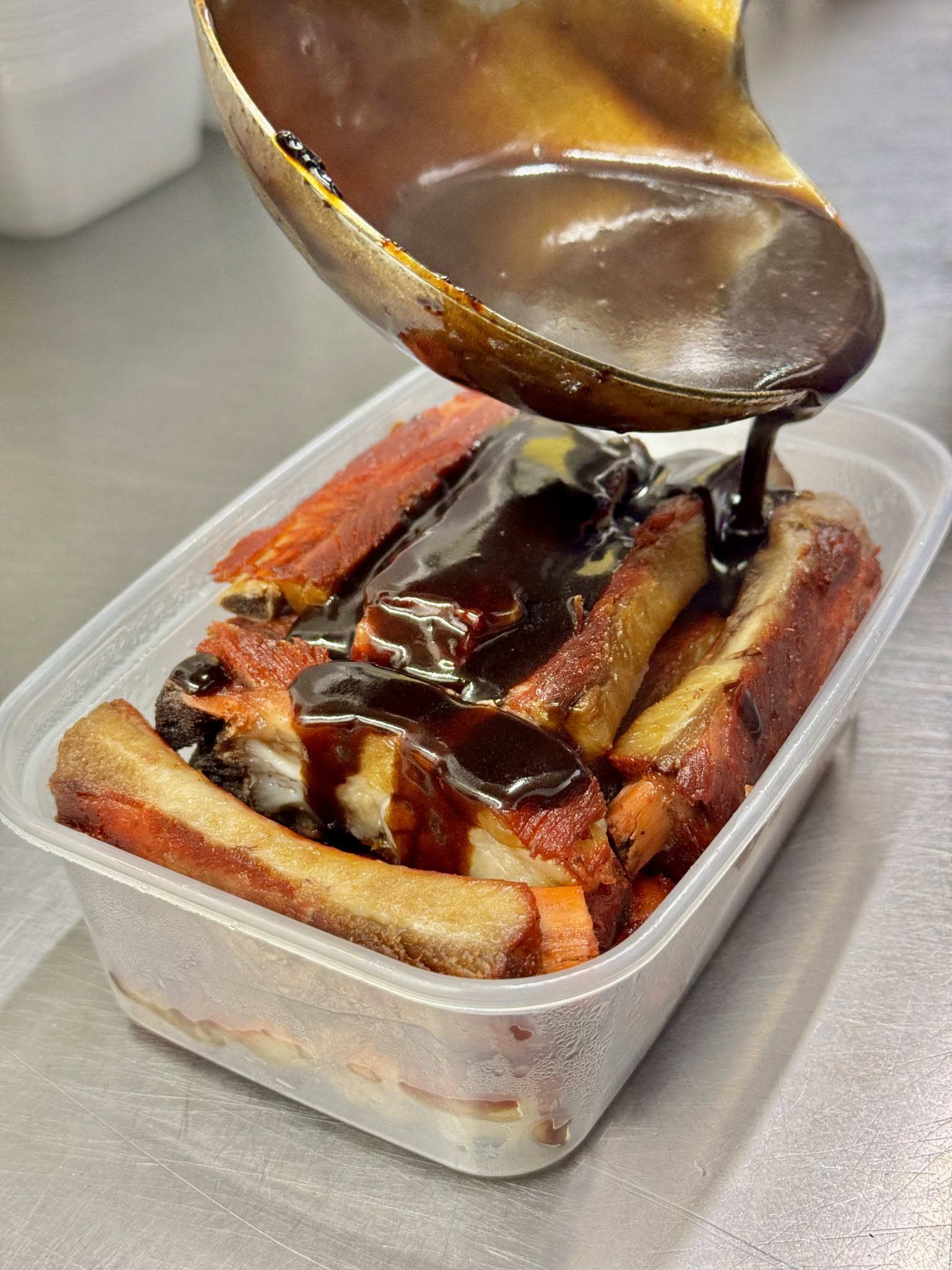 Barbecue spare ribs covered in rich barbecue sauce