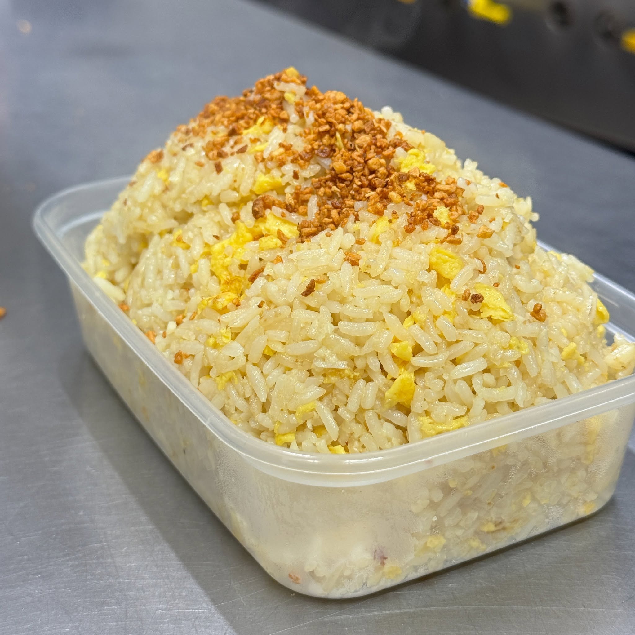 Freshly cooked garlic fried rice